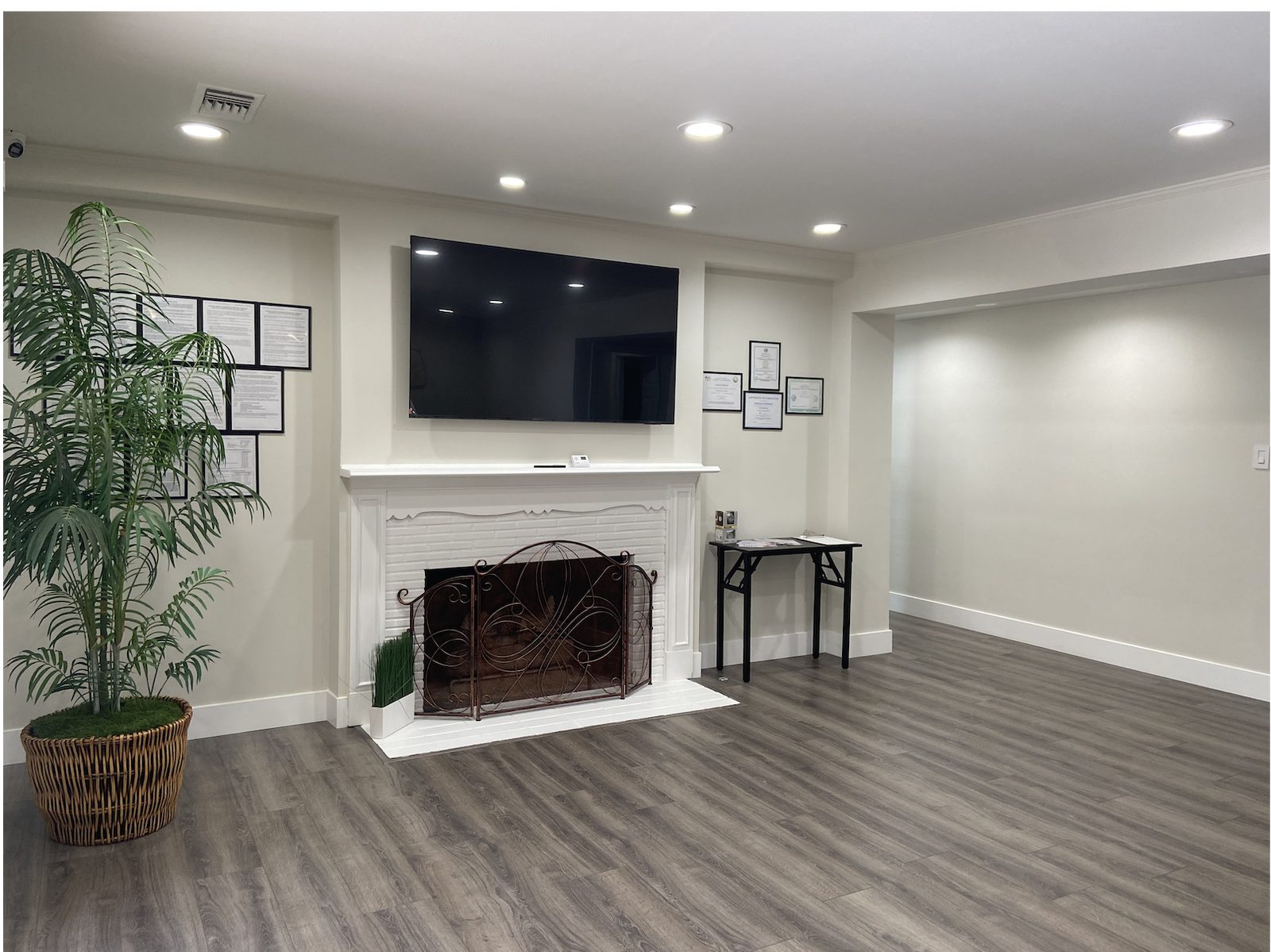 Fireplace and television lounge at Loving Care for You in Sherwood Forest